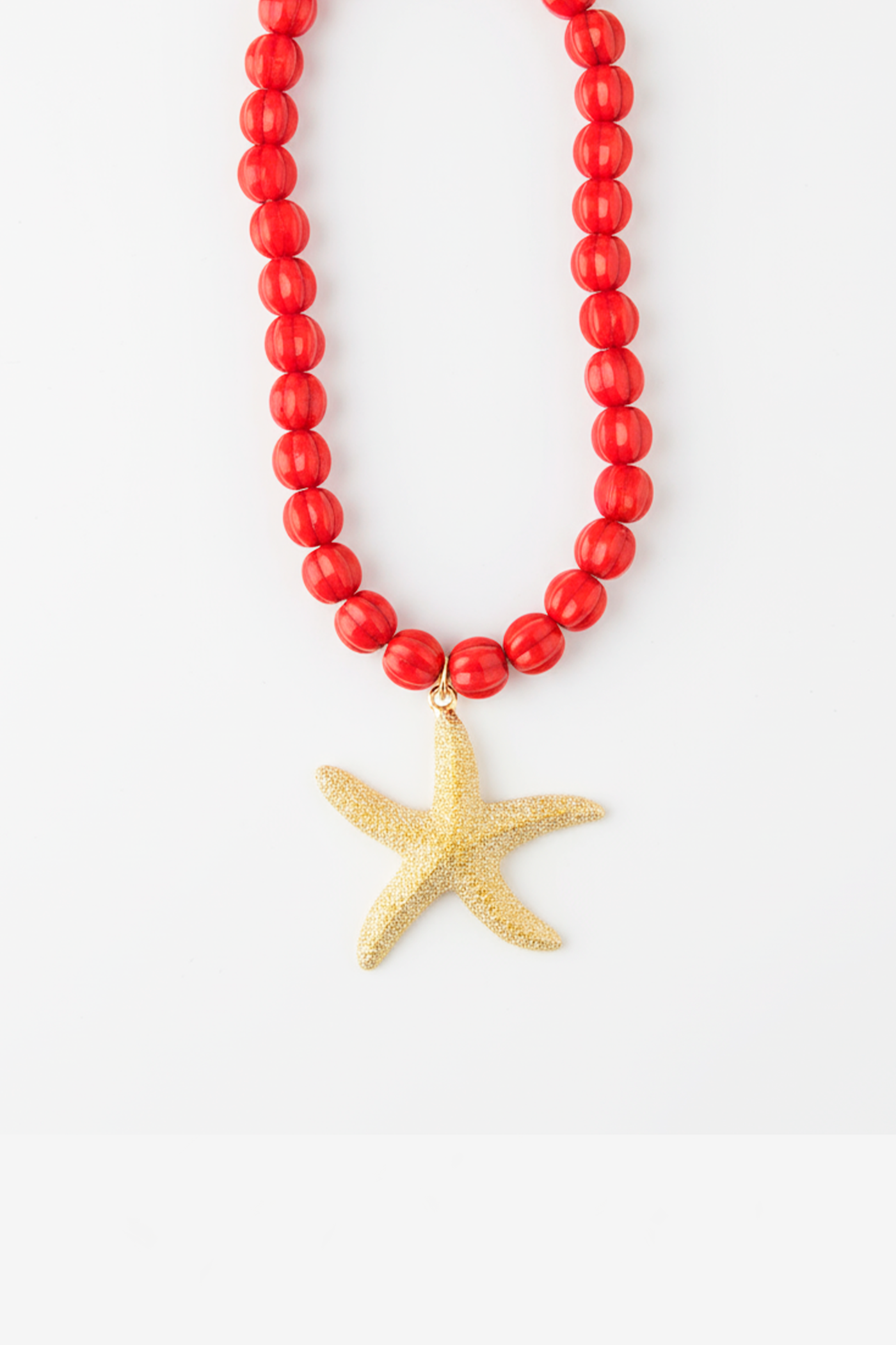 Collar perlas rojas estrella