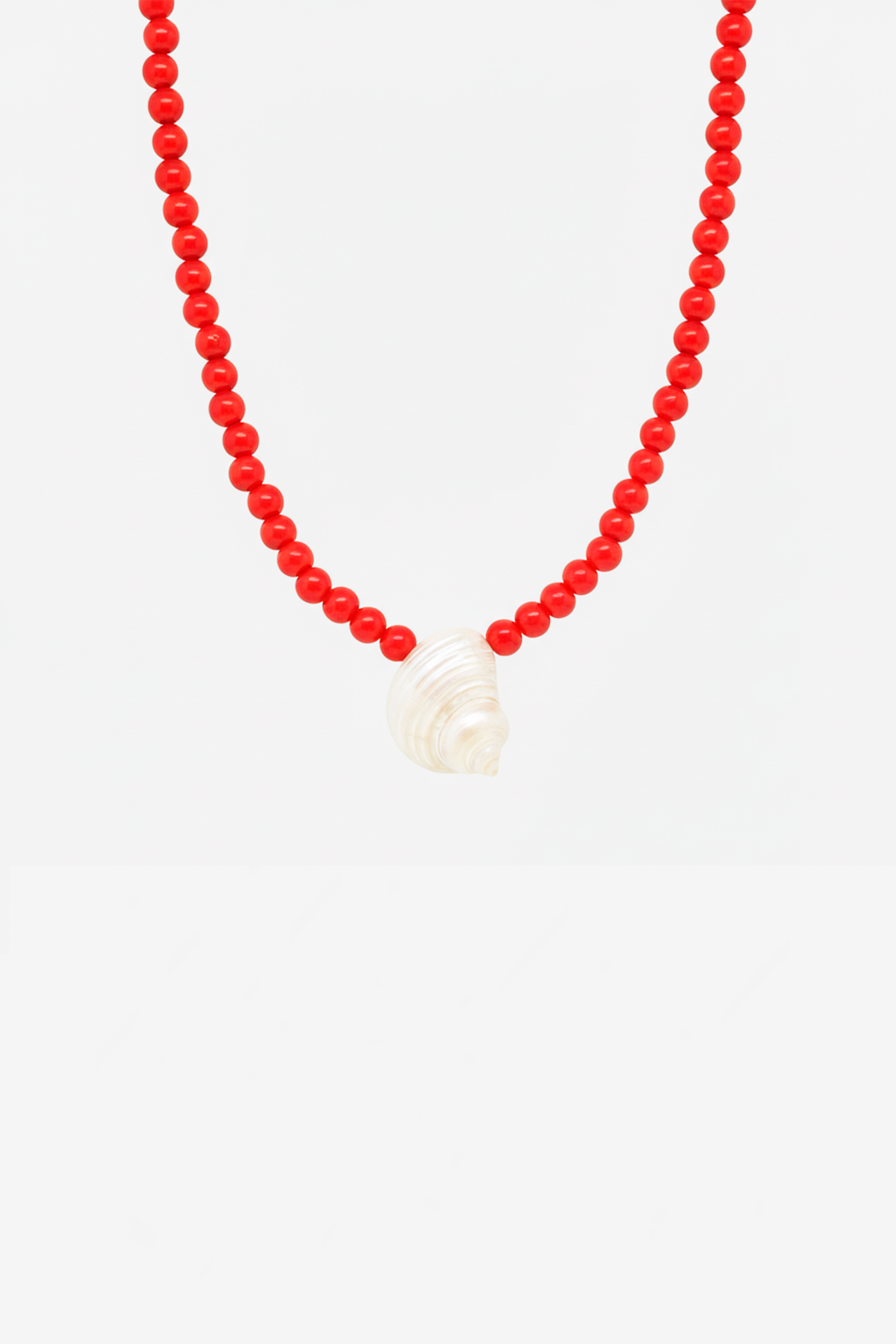 Collar perlas rojas caracol